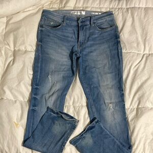 Distressed Blue Denim Jeans